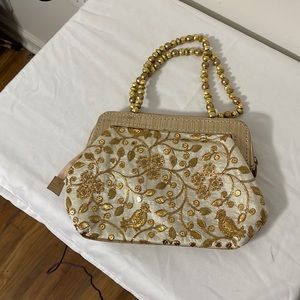 small purse white and gold